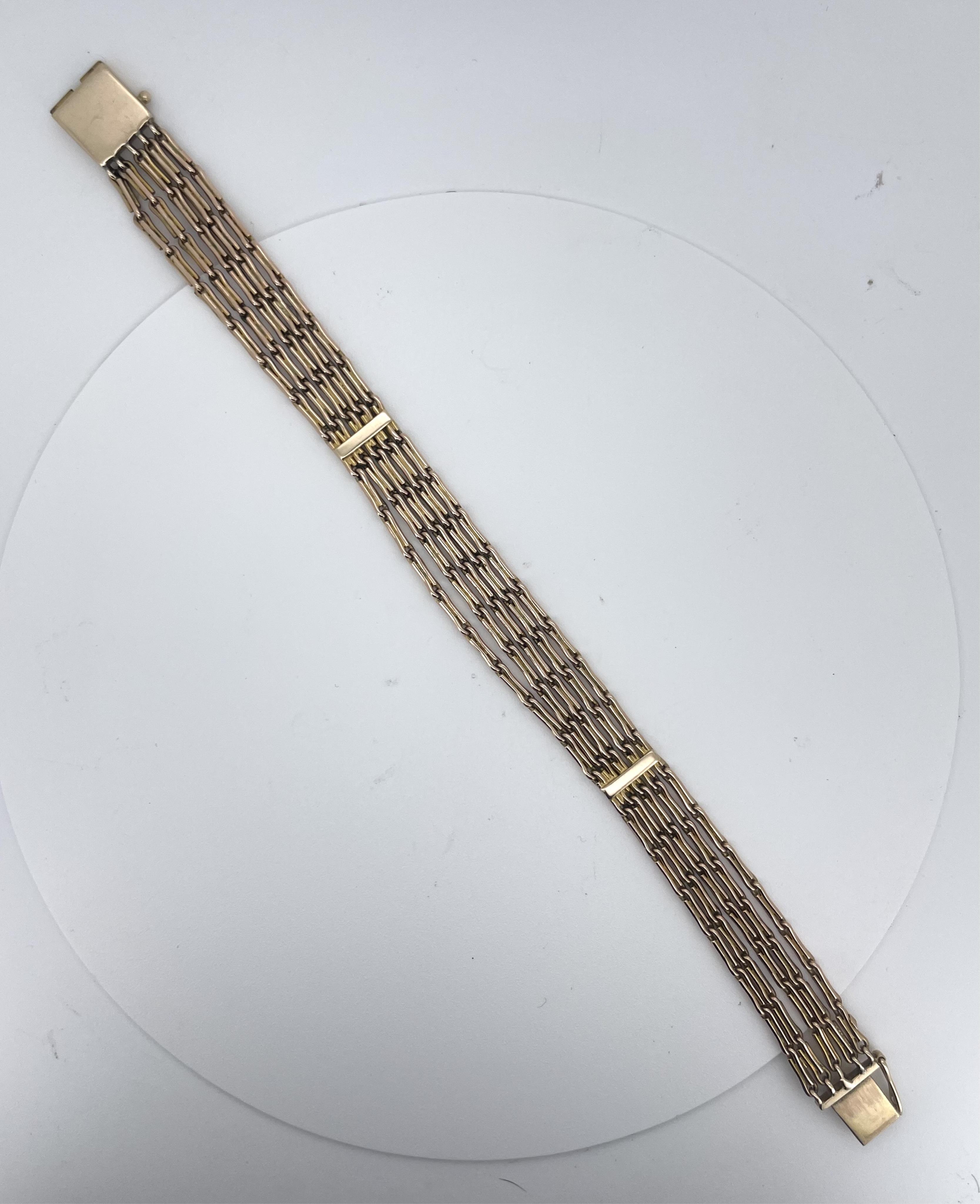 An attractive gold bracelet, early 20th century, composed of five strands of fancy linking, to a panel clasp, length approximately 17cm, gross weight approximately 18 grams